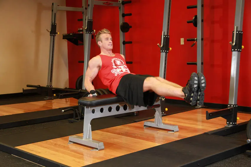 Seated Leg Tucks — end position