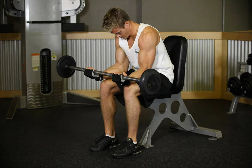 Seated Palm-Up Barbell Wrist Curl — end position