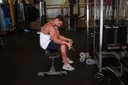 Seated Two-Arm Palms-Up Low-Pulley Wrist Curl exercise