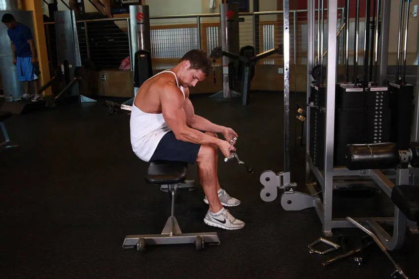 Seated Two-Arm Palms-Up Low-Pulley Wrist Curl exercise