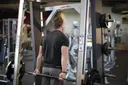 Smith Machine Behind the Back Shrug exercise