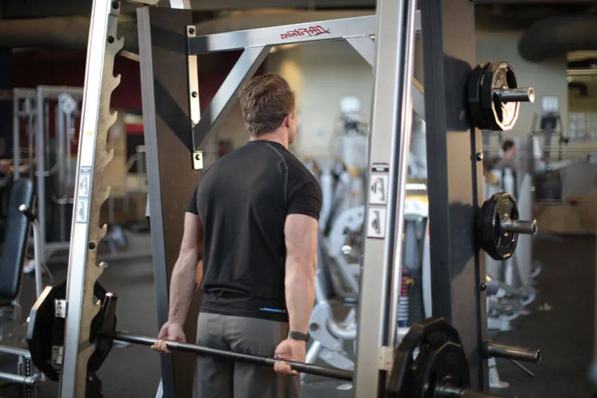 Smith Machine Behind the Back Shrug exercise