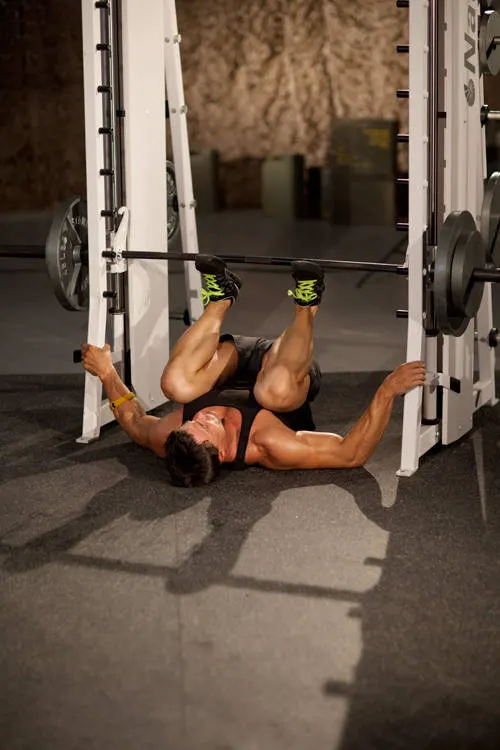 Smith Machine Leg Press — end position