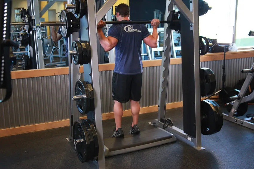 Smith Machine Reverse Calf Raises — end position