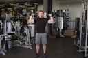 Standing Alternating Dumbbell Press exercise