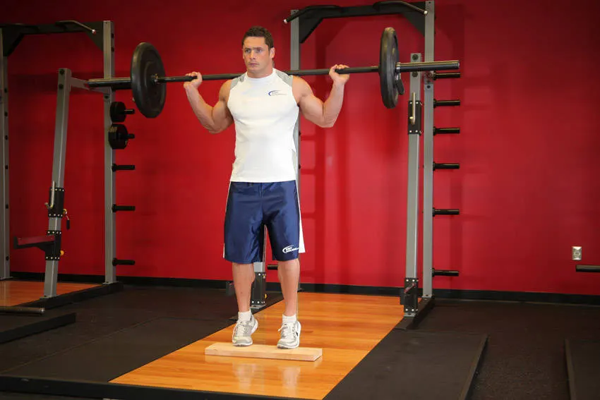 Standing Barbell Calf Raise exercise