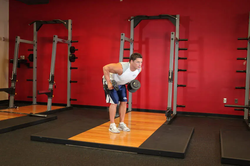 Standing Bent-Over Two-Arm Dumbbell Triceps Extension exercise