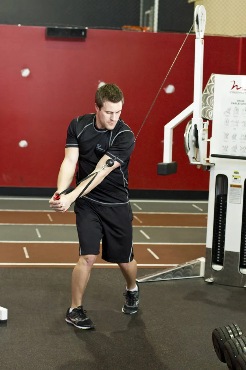 Standing Cable Wood Chop — end position