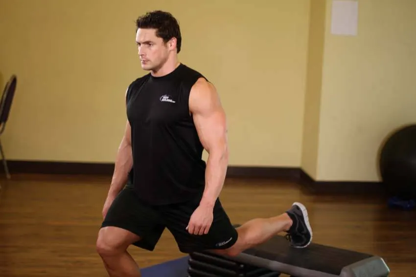 Standing Elevated Quad Stretch — end position