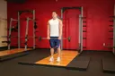 Standing Front Barbell Raise Over Head exercise