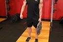 Standing Olympic Plate Hand Squeeze exercise