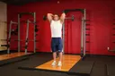 Standing Overhead Barbell Triceps Extension exercise