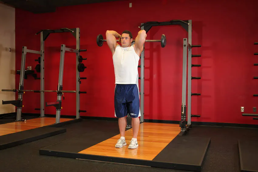 Standing Overhead Barbell Triceps Extension exercise