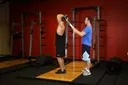 Standing Towel Triceps Extension exercise