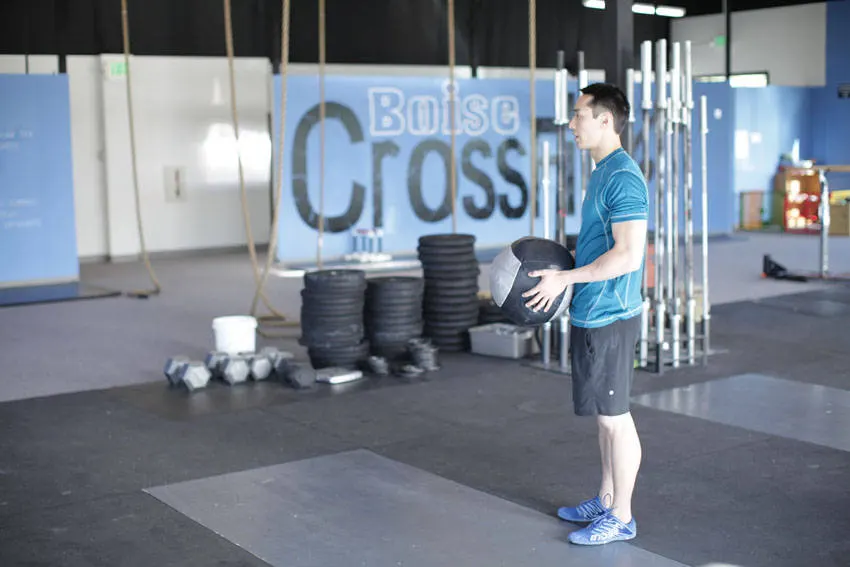 Standing Two-Arm Overhead Throw exercise