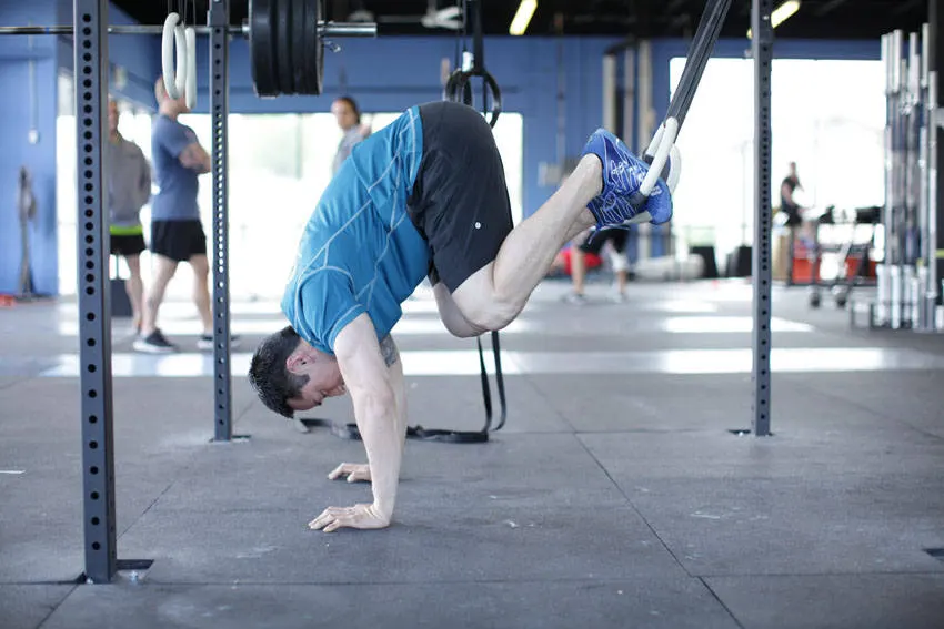 Suspended Reverse Crunch — end position