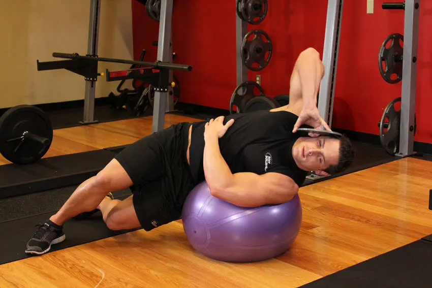 Weighted Ball Side Bend exercise