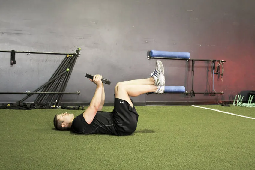 Weighted Crunches exercise