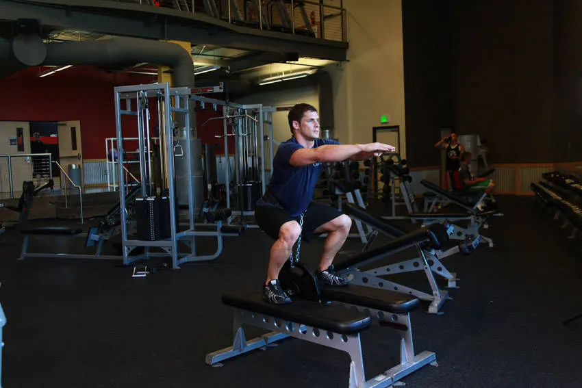 Weighted Squat — end position