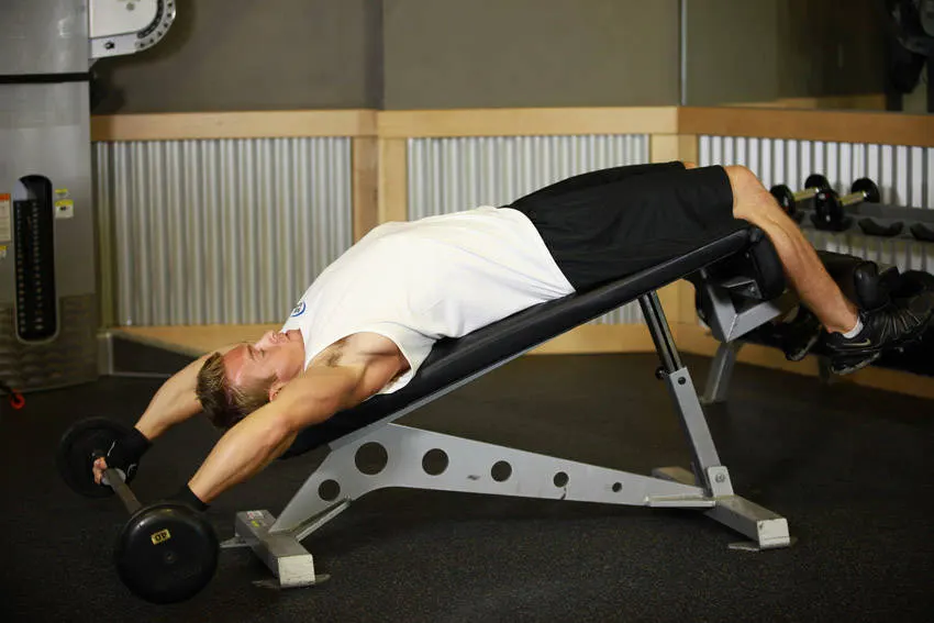 Wide-Grip Decline Barbell Pullover — end position